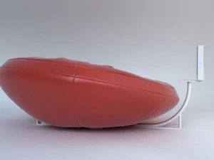 red leather sofa with pillows and tv 3D Model