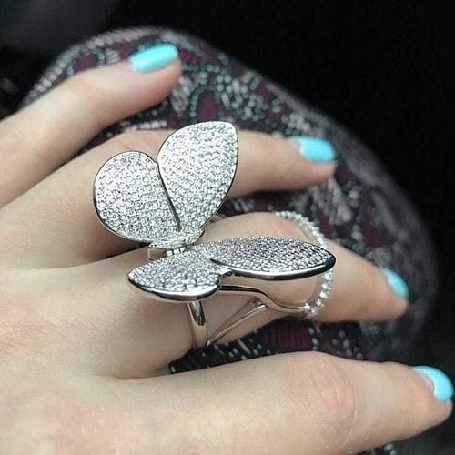 Butterfly ring with best sale moving wings