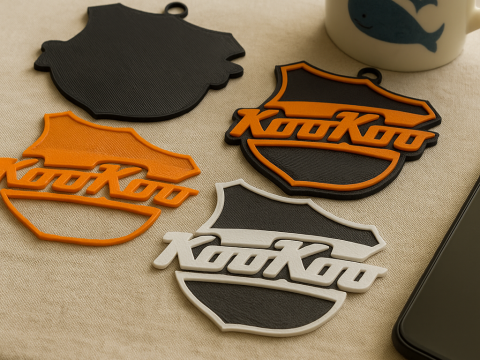 Liiga KooKoo keychain badge color printable and renderable Model Cetak 3D