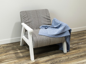 ozy comfortable chair with a knitted blanket Model 3D