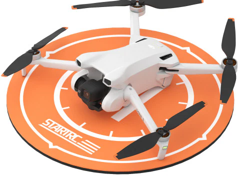 Drone dji mini con piattaforma di atterraggio Modello 3D